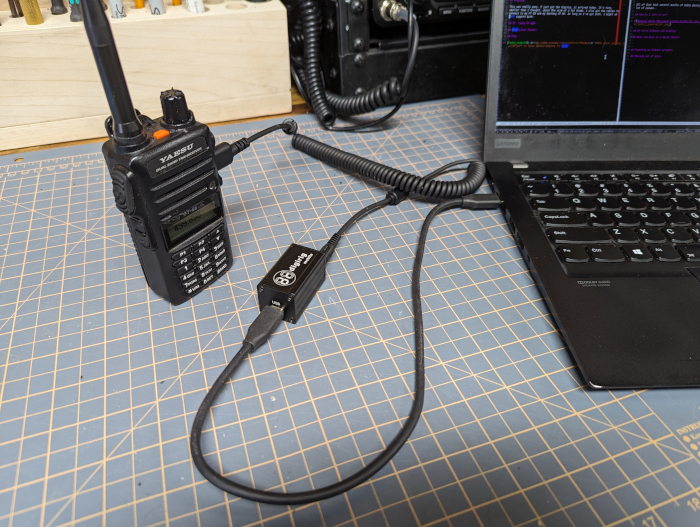 Hero shot of my Yaesu FT-65R, Digirig and laptop ready for Winlink