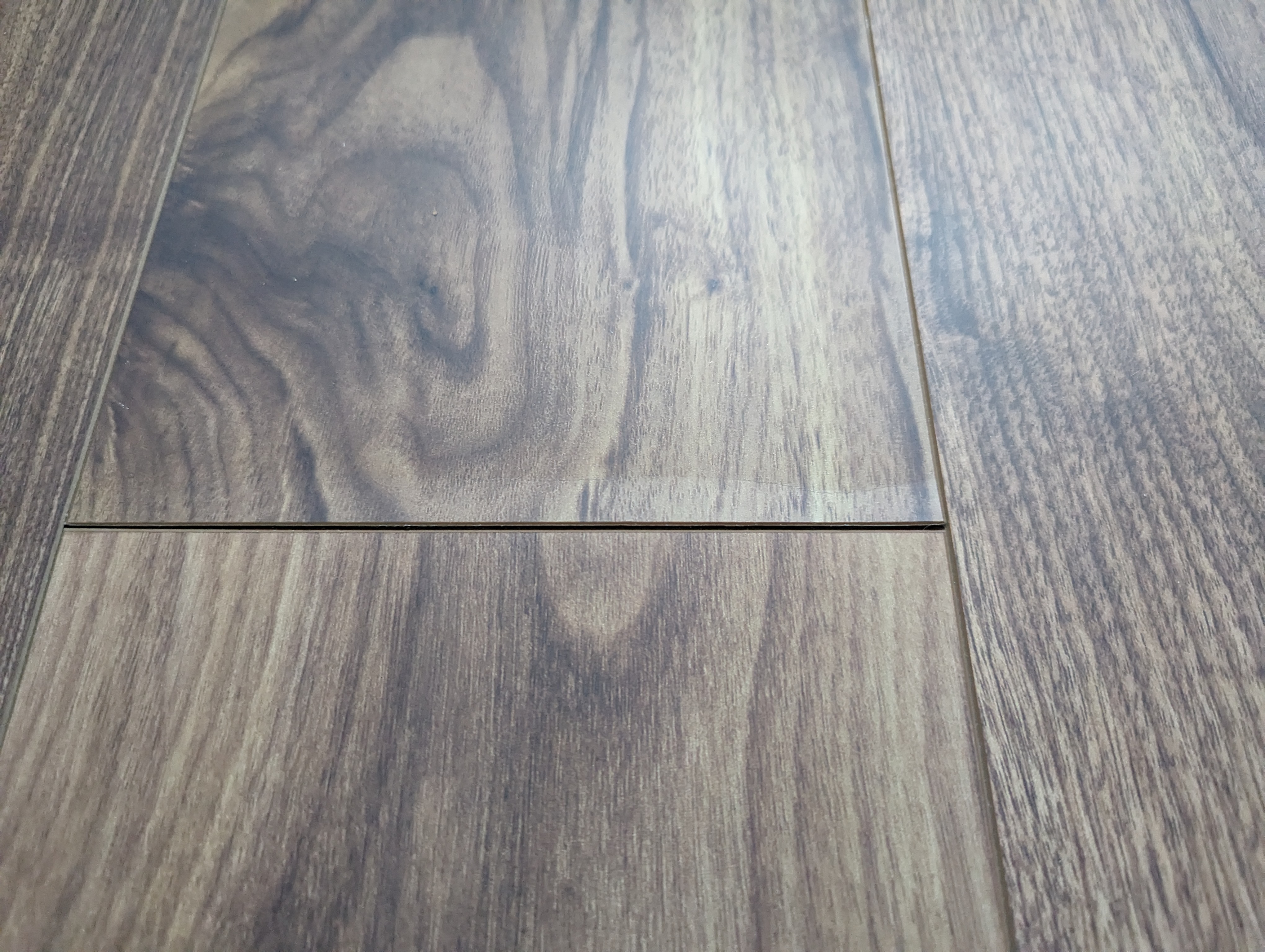 Delaminating floor plank